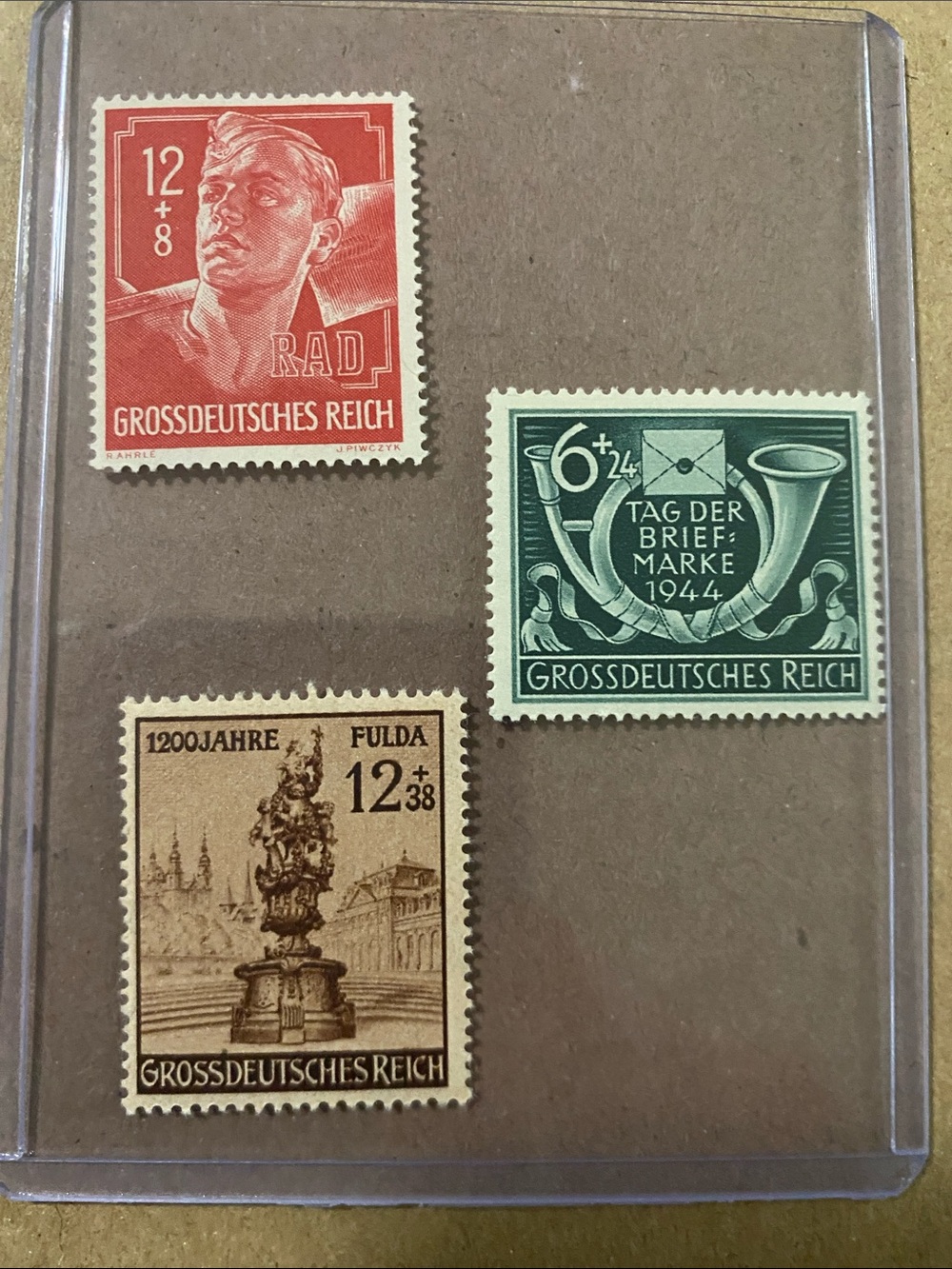 Three Vintage German 'Grossdeutsches Reich' Stamps - Red, Green, Tan